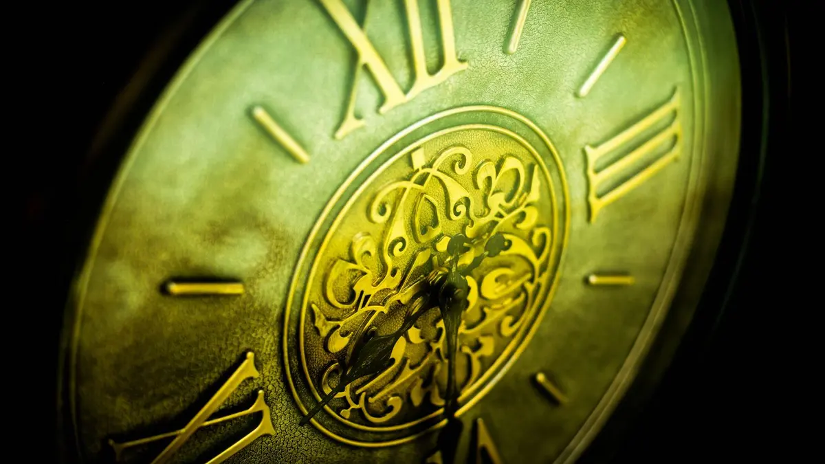 Antique clock face with Roman numerals