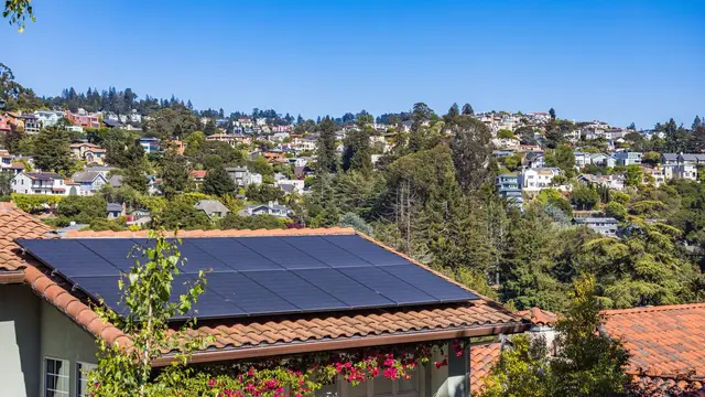 House with solar panels on a sunny roof