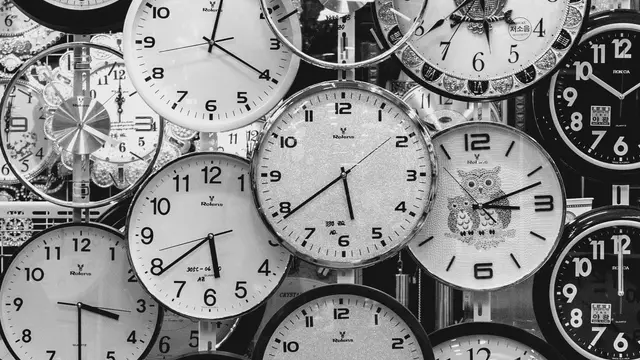 Rows of vintage wall clocks
