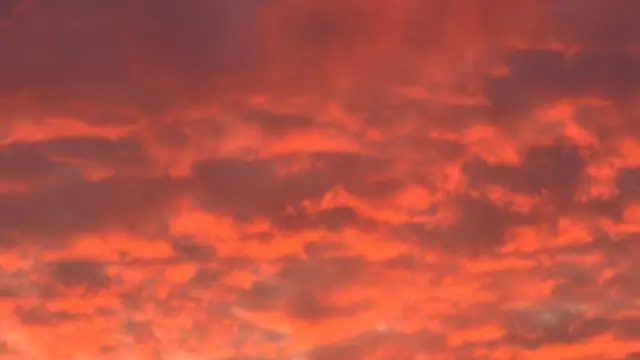 Vivid red and orange sunset clouds